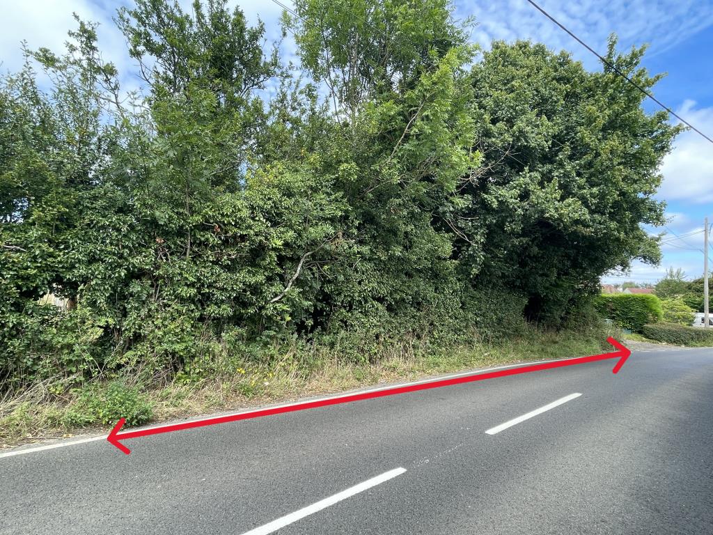 Lot: 20 - GREENBELT LAND EXTENDING TO 1.12 ACRES - External image of land facing onto Cudham Lane North with arrows showing front boundary